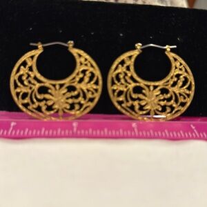 Gold colored earrings